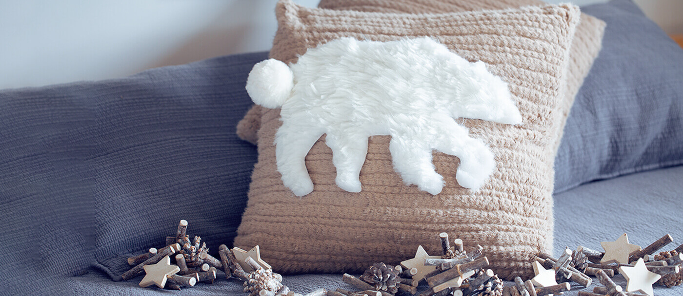 How to make a polar bear soft toy or polar bear cushion from fleece wool.
