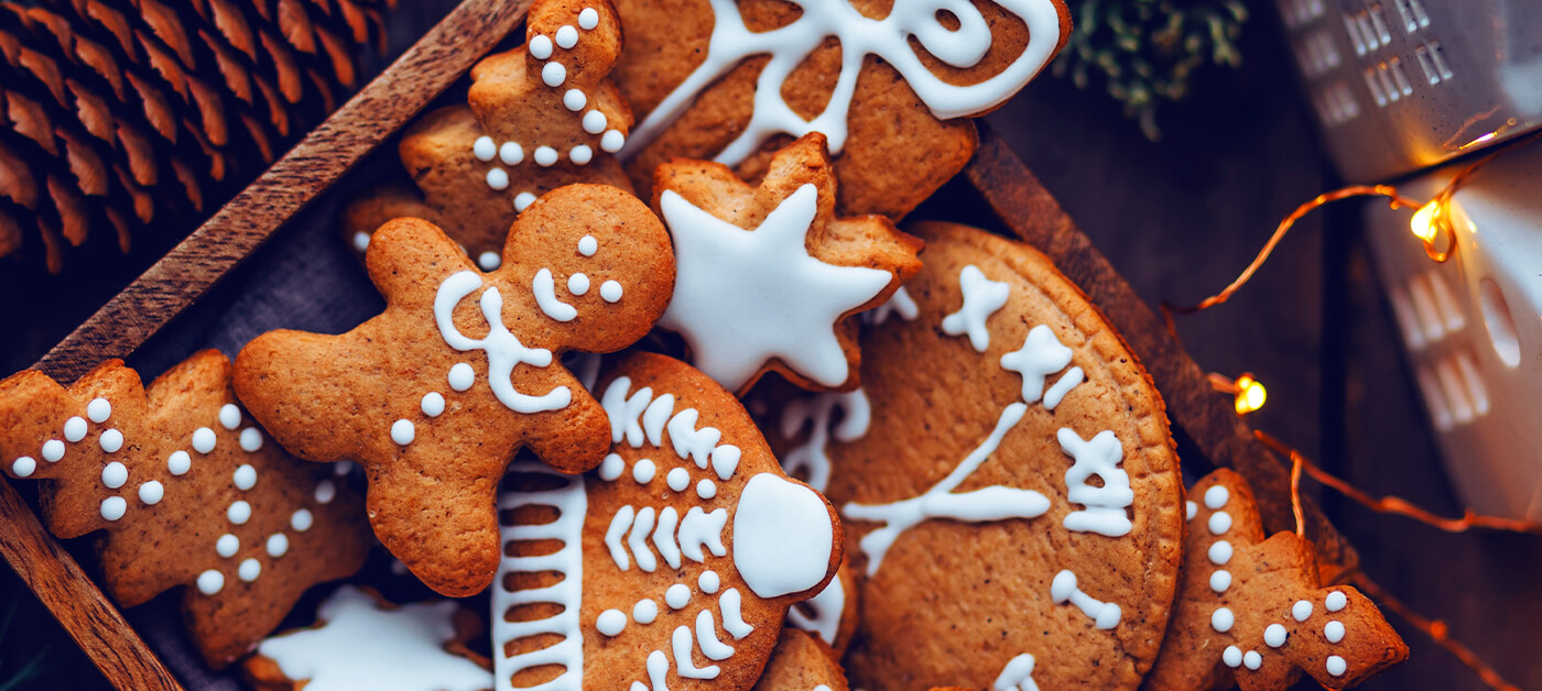A tray of gingerbread cookies beautifully decorated with icing.